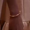 Bracciale Eroz Edizione in oro 24 carati dorato Bracciale Eroz Edizione in oro 24 carati dorato
