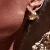 Orecchini a bottone Eroz Edizione in oro 24 carati dorati Orecchini a bottone Eroz Edizione in oro 24 carati dorati